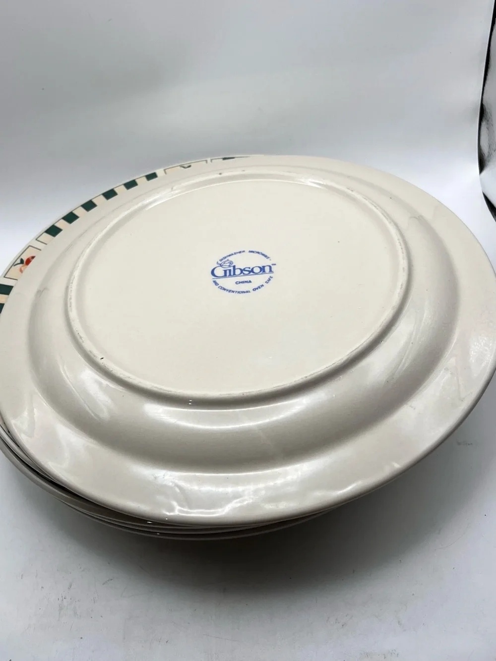 Gibson Cream Dinner Plate with Green Check Rim and Fruit Basket